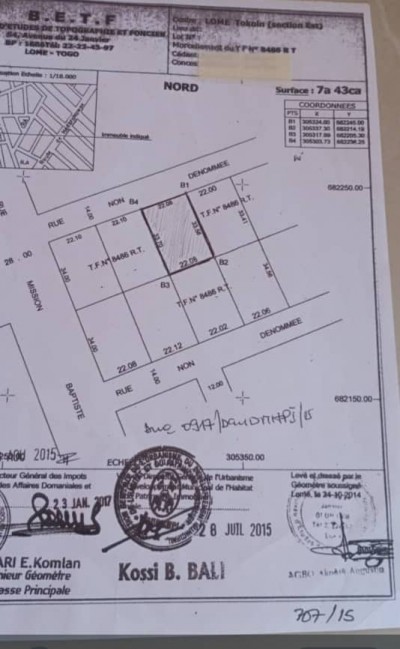 1 lot 1/4 avec titre foncier global  à 30m du goudron